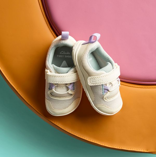 Model wearing Clarks babies shoes