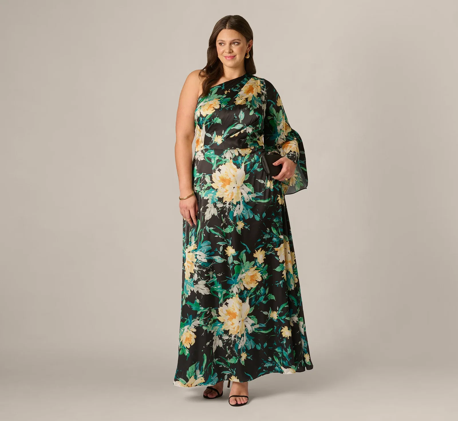 Image of Plus Size One Shoulder Long Sleeve Floral Satin Gown In Black Multi