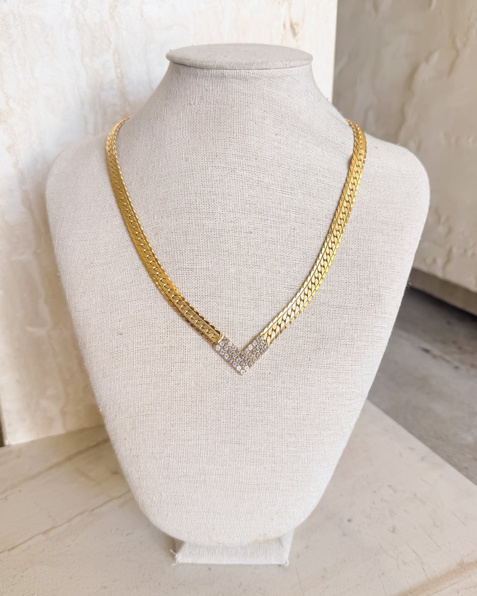 Image of Vintage Crystal Studded "V" shaped gold tone necklace