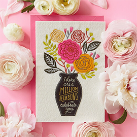 Card with flowers in vase.
