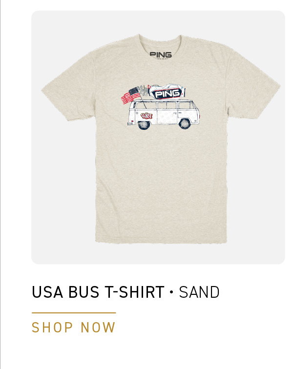 Front image of the USA BUS T-SHIRT in Sand. Text reads: USA BUS T-SHIRT- SAND. Click to SHOP NOW.