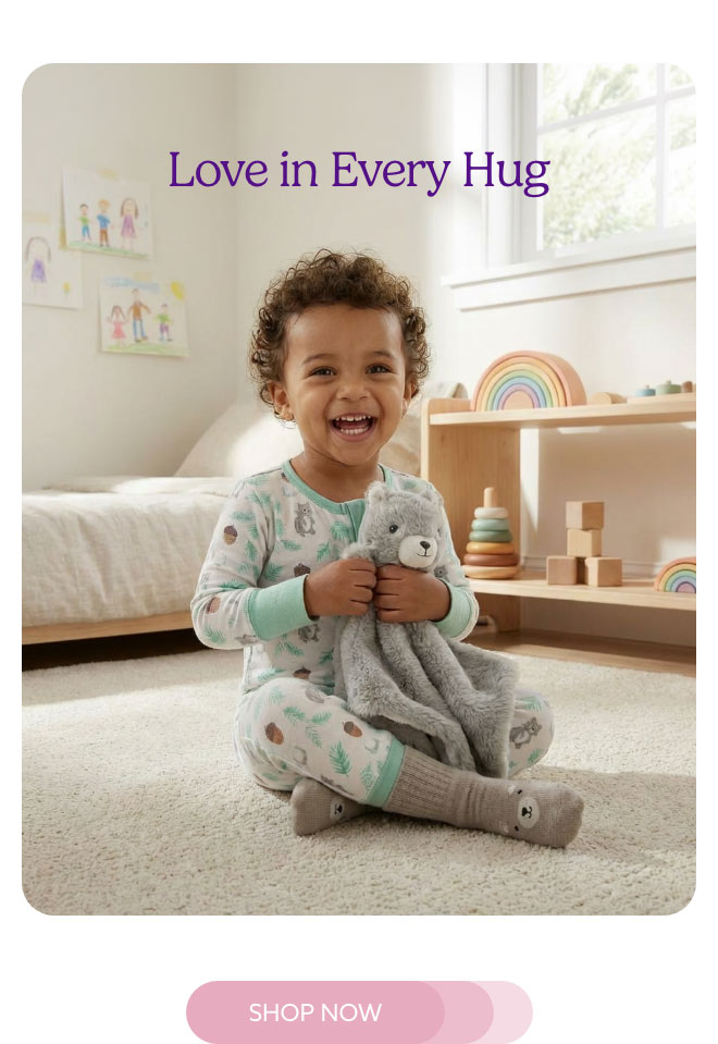 A little boy holding a Gray Squirrel Lovey Blanket. Shop New Arrivals..