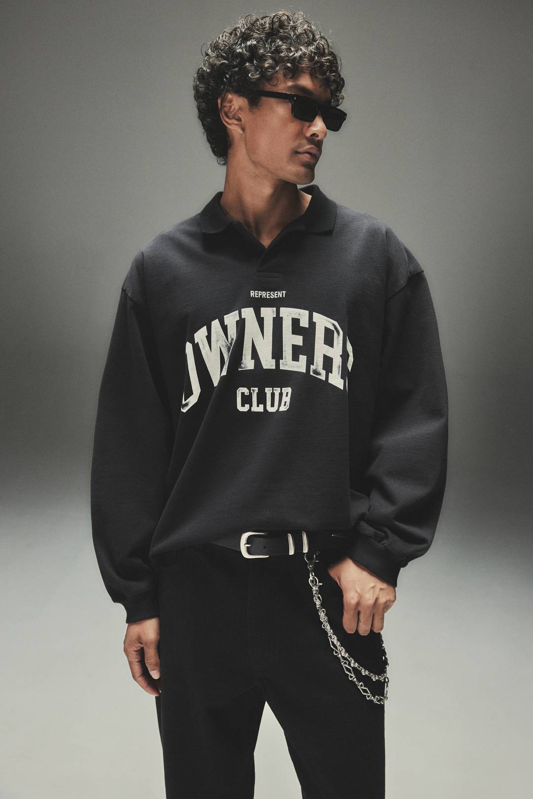 Model wearing the Owners' Club Rugby Polo in Jet Black