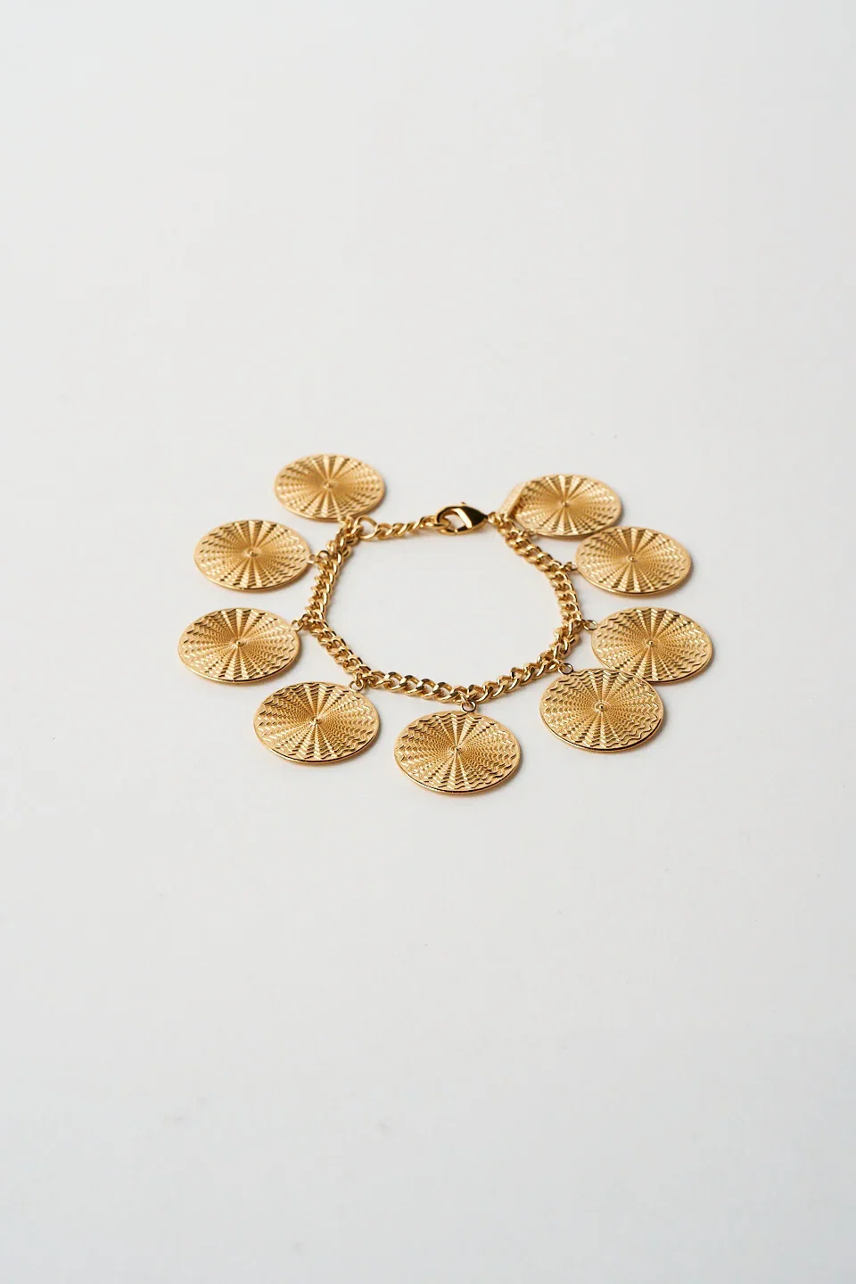 Image of The Chaos Sunburst Charm Bracelet in Gold