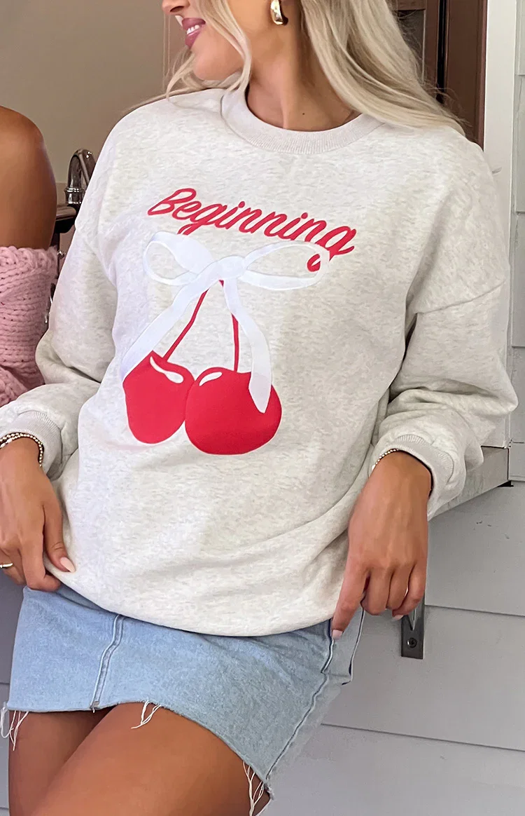 Image of Elodie Oat Marle Cherry Print Crew Neck Sweater
