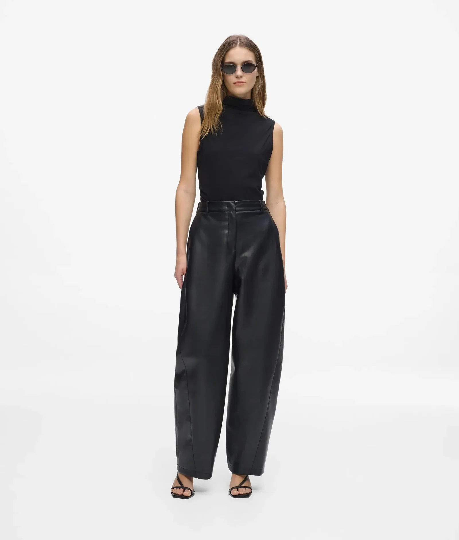 Image of Faux leather barrel leg pants