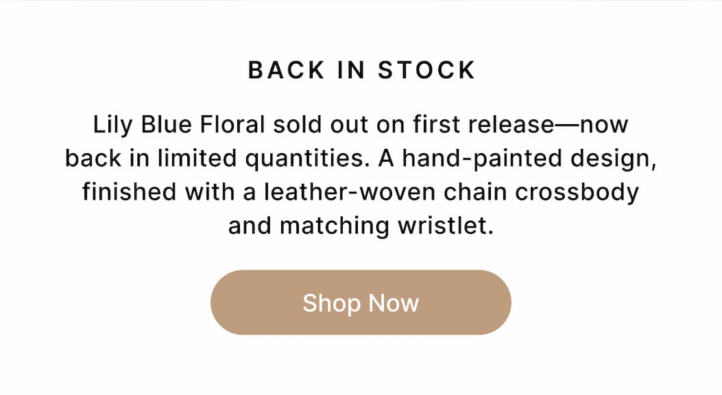 BACK IN STOCK Lily Blue Floral sold out on first release—now back in limited quantities. A hand-painted design, finished with a leather-woven chain crossbody and matching wristlet. Shop Now