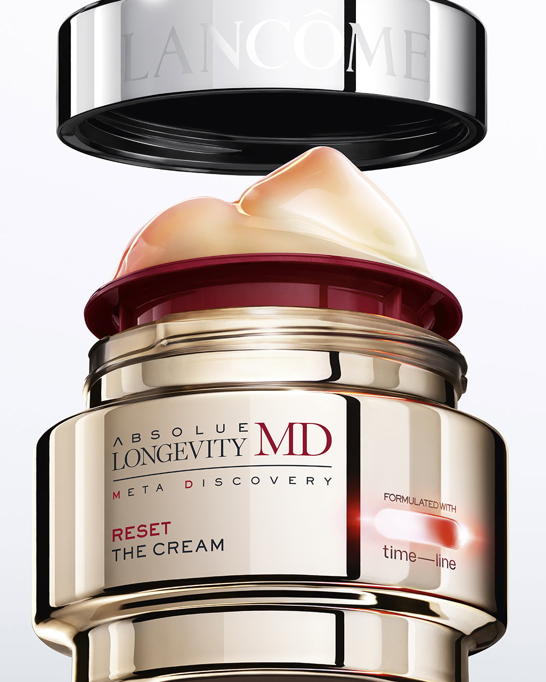 Vasetto aperto di Lancôme Absolue Longevity MD Reset The Cream con texture crema in evidenza su sfondo neutro.