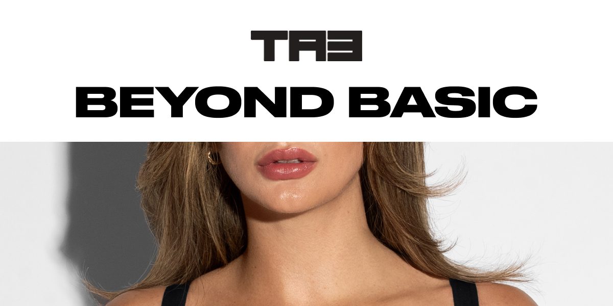 BEYOND BASIC. The image features a woman with long hair and a neutral background.