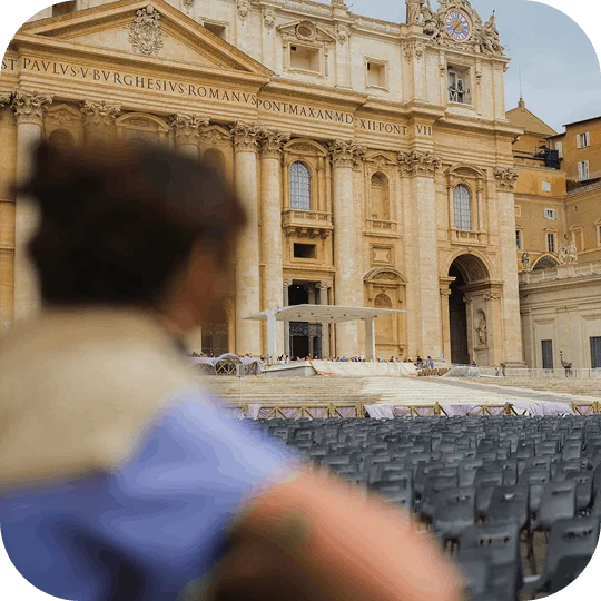 Person looking at St. Peter's Square in Vatican City
