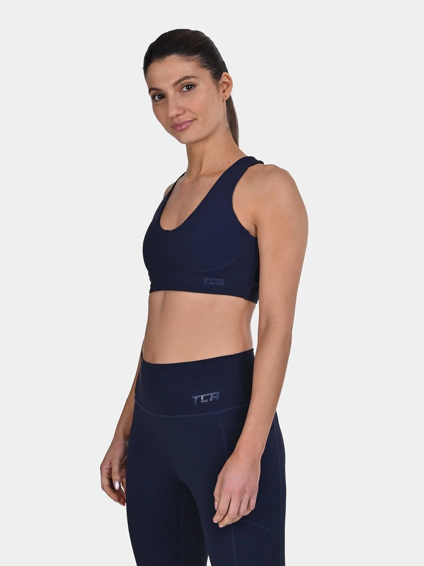 Image of TCA Racerback Sports Bra for Women _ Seamless Wireless Bra with Removable Pads for Yoga, Pilates & Low-Impact Training