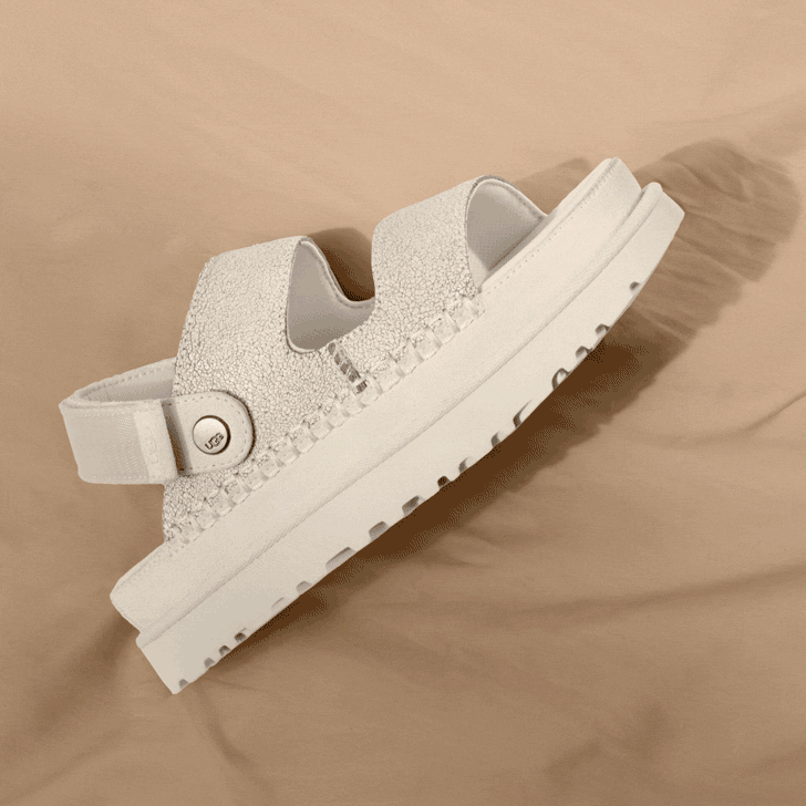 A GIF of the Goldenstar Crackle Slide in various positions, sitting on fabric.