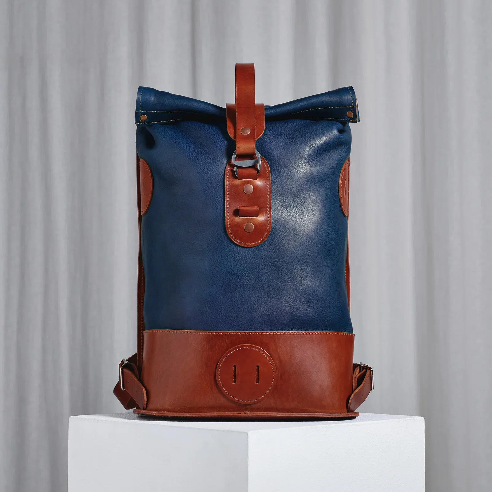 Image of Pre-order – Small Fold Top – Leather Backpack in Navy & Brown