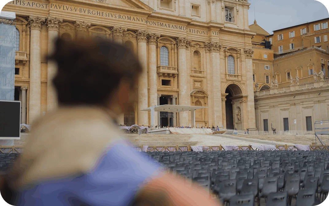 Person looking at St. Peter's Square in Vatican City
