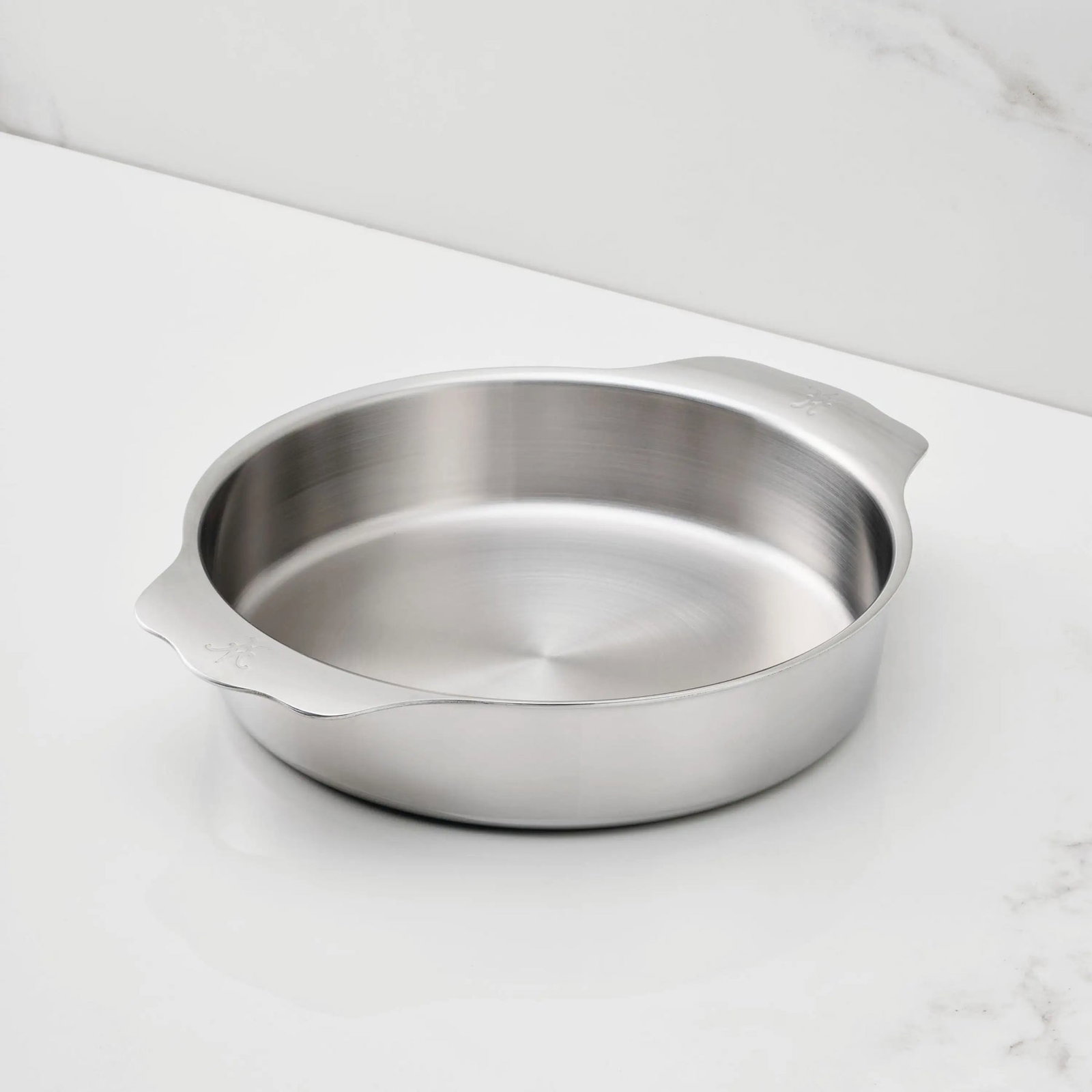 IMG: Round Baker, 9-inch on marble countertop