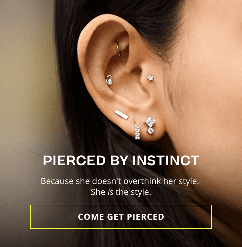 Close up of ear stack with modern, geometric diamond studs. Pierced by instinct. Click here to come get pierced