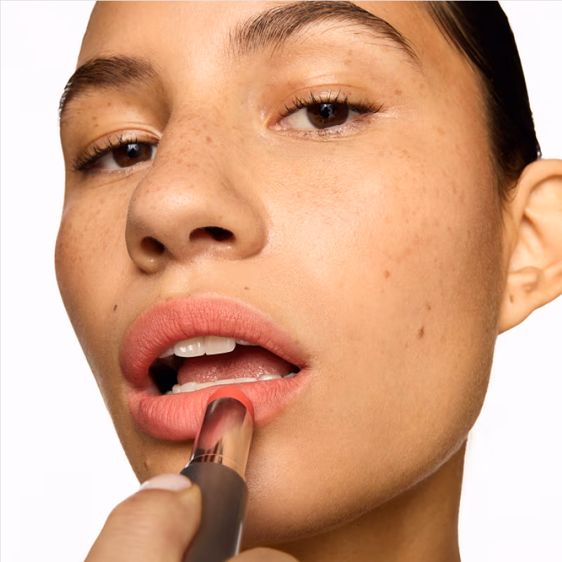 Model applying Unlipstick