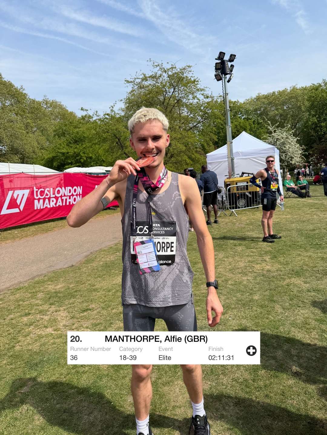 Alfie Manthorpe posing with his London Marathon Medal