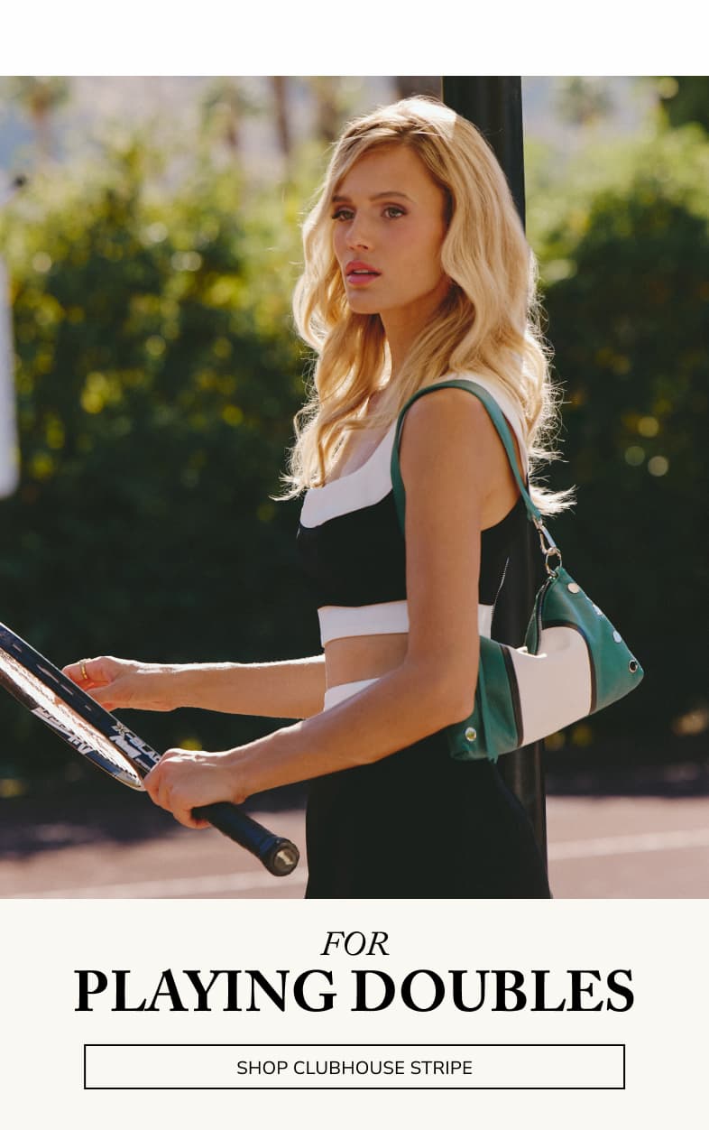 For Playing Doubles. CTA: Shop Clubhouse Stripe. Model is playing tennis with Kyle Sml on shoulder in clubshouse stripe 