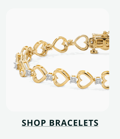 Gold bracelet with open-hearts, accented with round diamonds between each. Click here to shop bracelets
