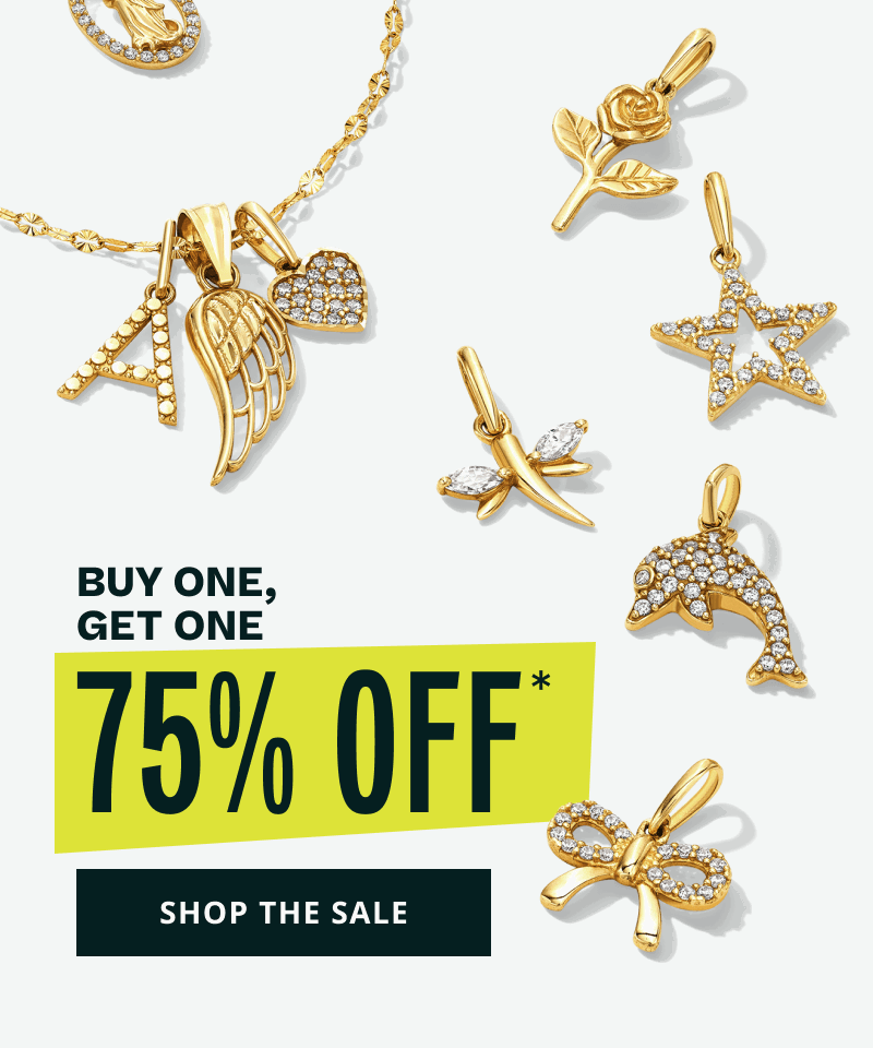 Multiple diamond encrusted gold charms, including dolphin & star. BOGO 75% OFF. Click here to shop the sale