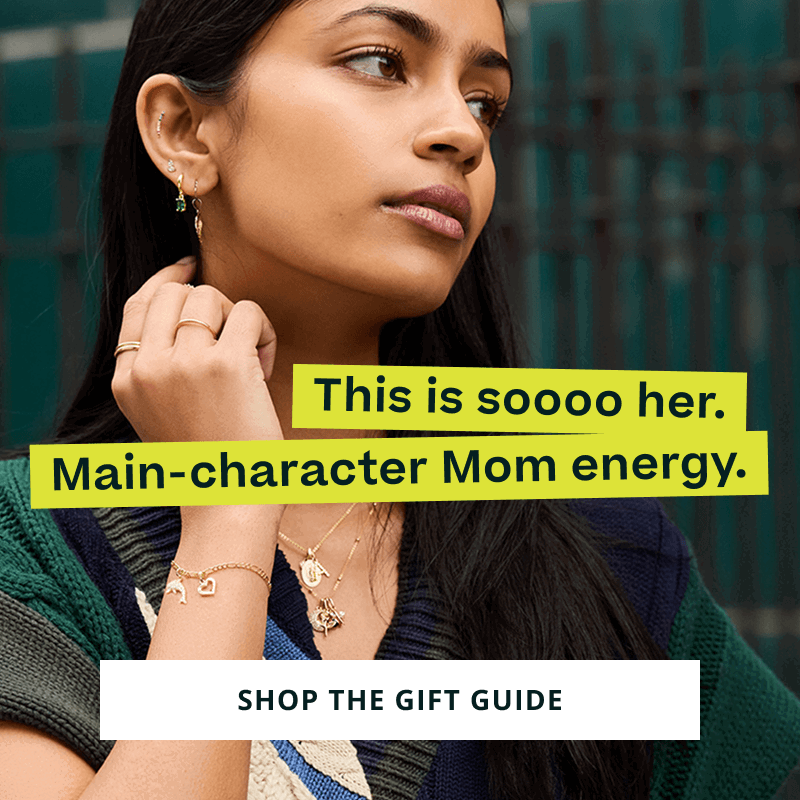 Focus on model’s gold neck & wrist layers + ear stack with pendants. So her. Click here to shop the gift guide
