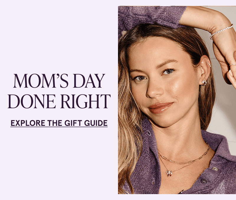 A model wearing gold gemstone jewelry. Mom’s day done right. Click here to explore the gift guide