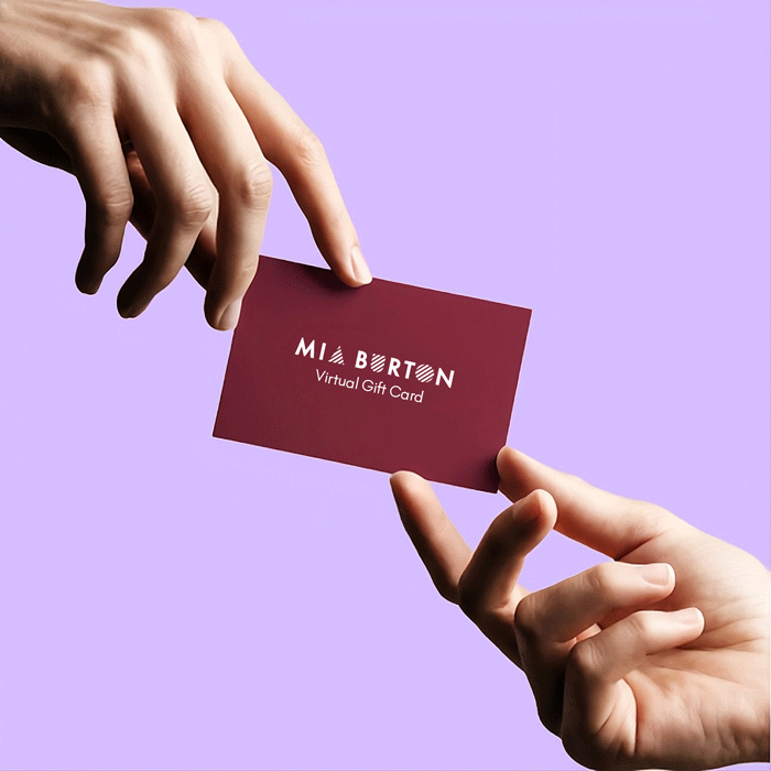 A hand offering a gift card