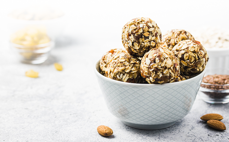 Seed Cycling Energy Bites in a white bowl