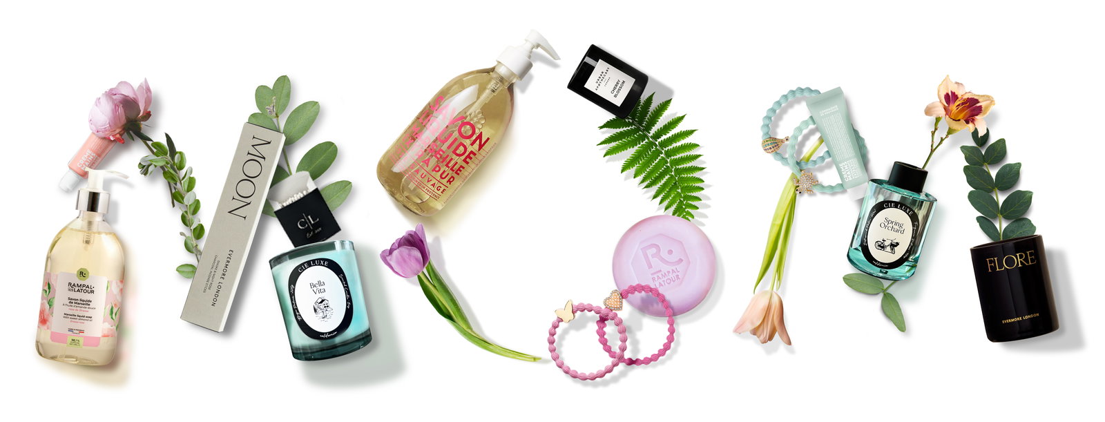 a white background with flowers and perfume bottles
