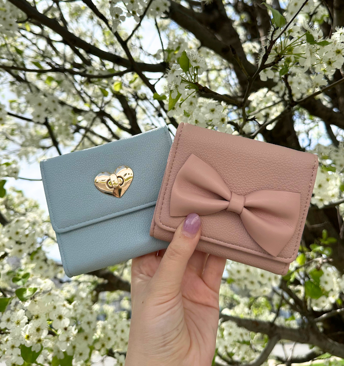 Two new womens wallets in blue and pink