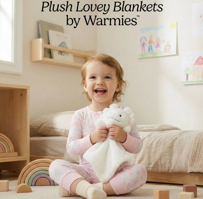 Little girl holding an Axolotl Lovey Blanket. Shop Lovey Blankets.
