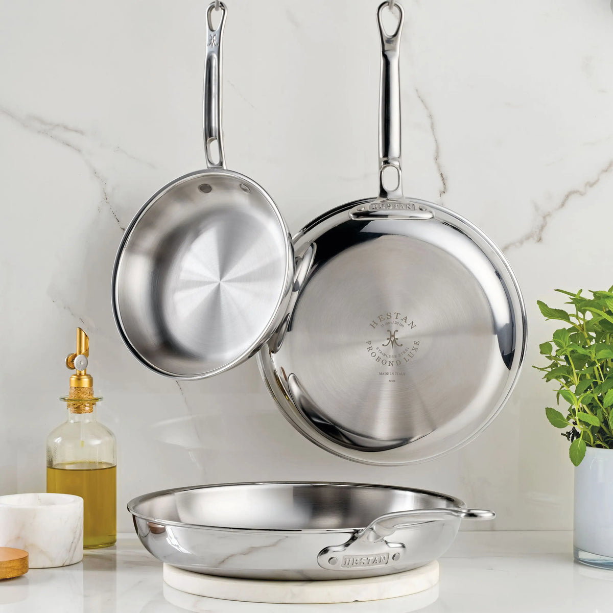 IMG: Lifestyle image of the 3-Piece Polished Clad Stainless Steel Skillets Set
