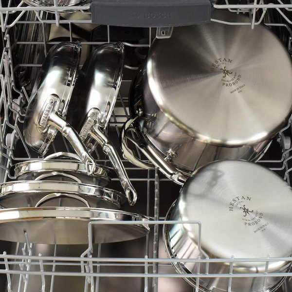 Image: Hestan ProBond clad stainless steel with sealed rims is displayed in the dishwasher.