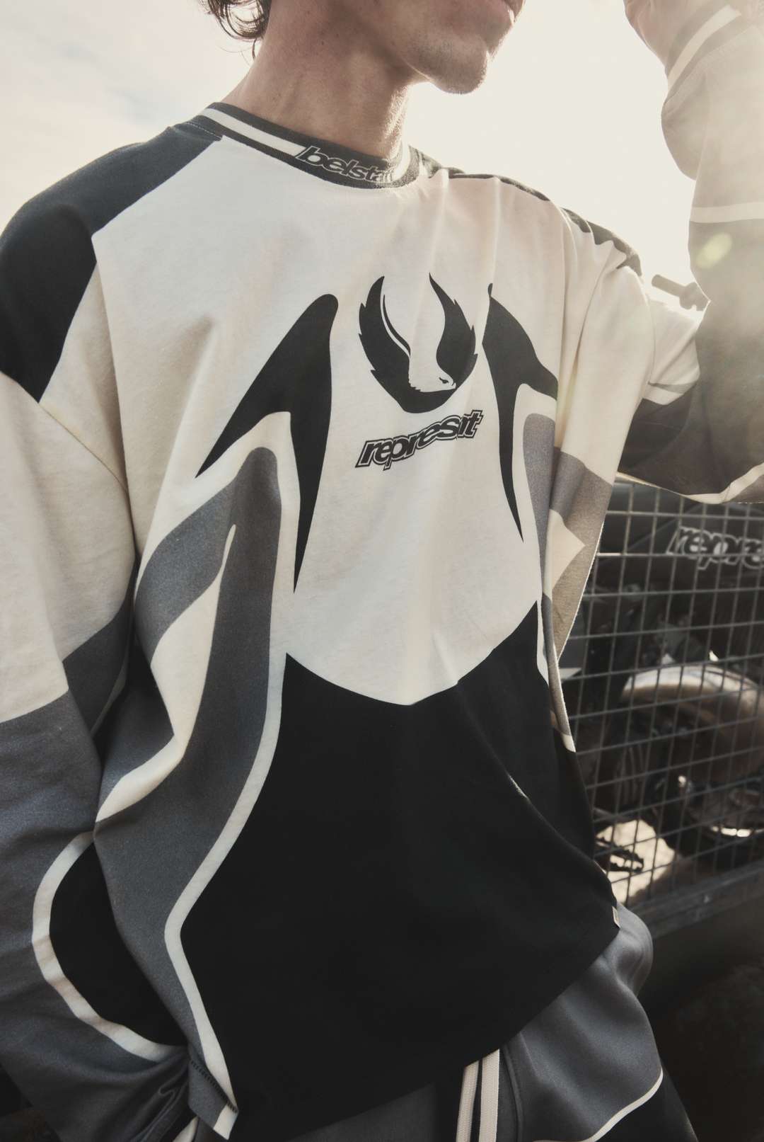 Model wearing the Represent x Belstaff Long Sleeve Racing T-Shirt