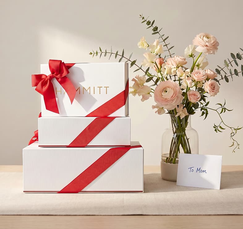 Image of white hammitt gift boxes with red ribbon
