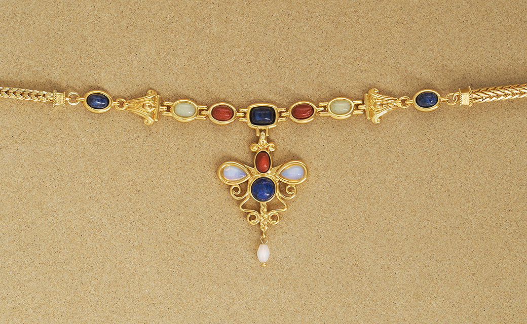 Roman-inspired plaited gold necklace with semi-precious stones and butterfly pendant. - Shop Now.