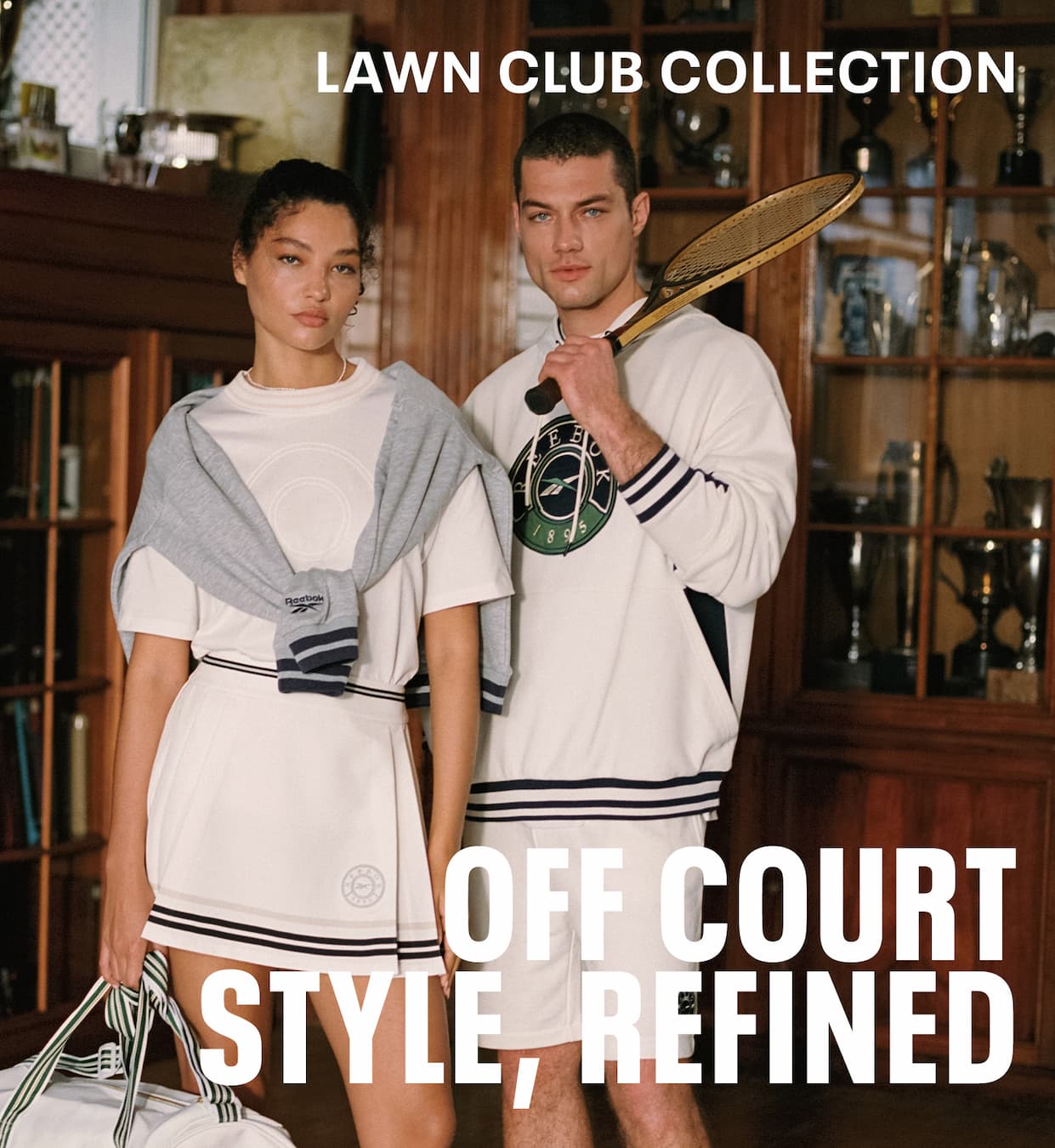 Two models wear Reebok Lawn Club tennis-inspired apparel and sneakers in a clubhouse setting with a racket and duffel bag. Text reads: “OFF COURT STYLE, REFINED.”