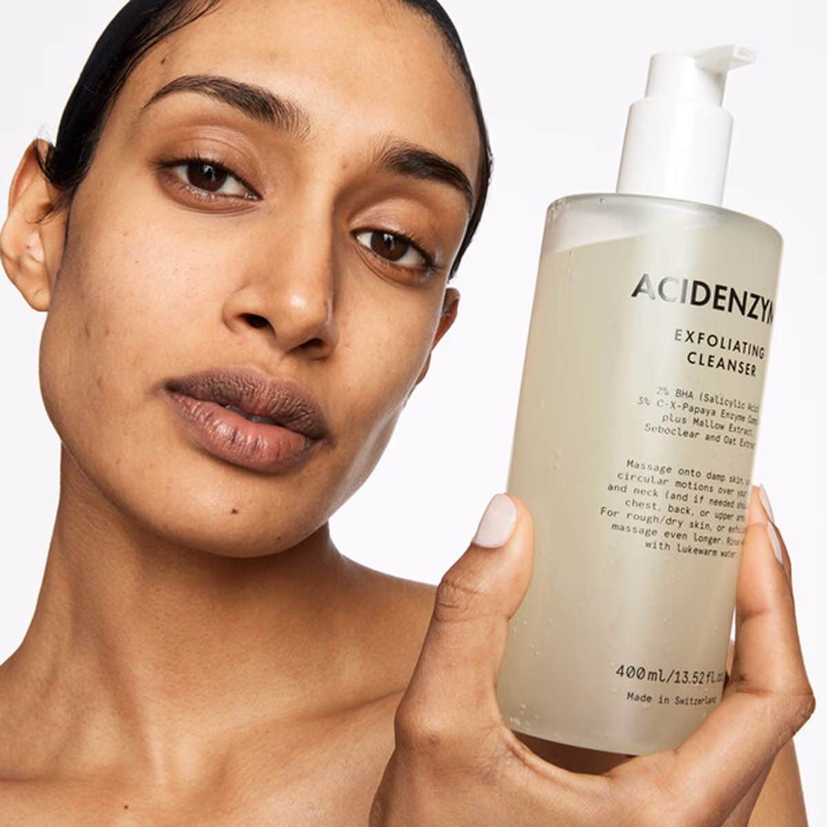 Model holding Acidenzyme cleanser