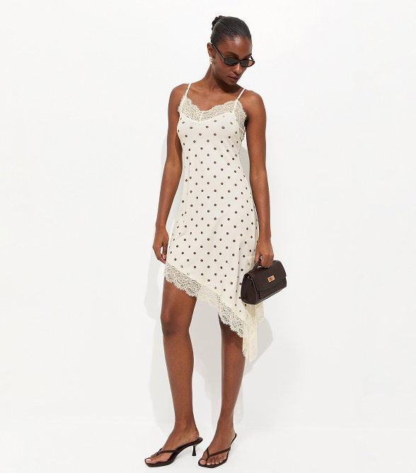 White Polka Dot Asymmetric Hem Mini Dress
