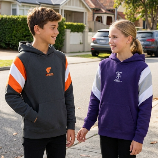 Two kids wearing our new AFL Youth's Box Fit Hoods