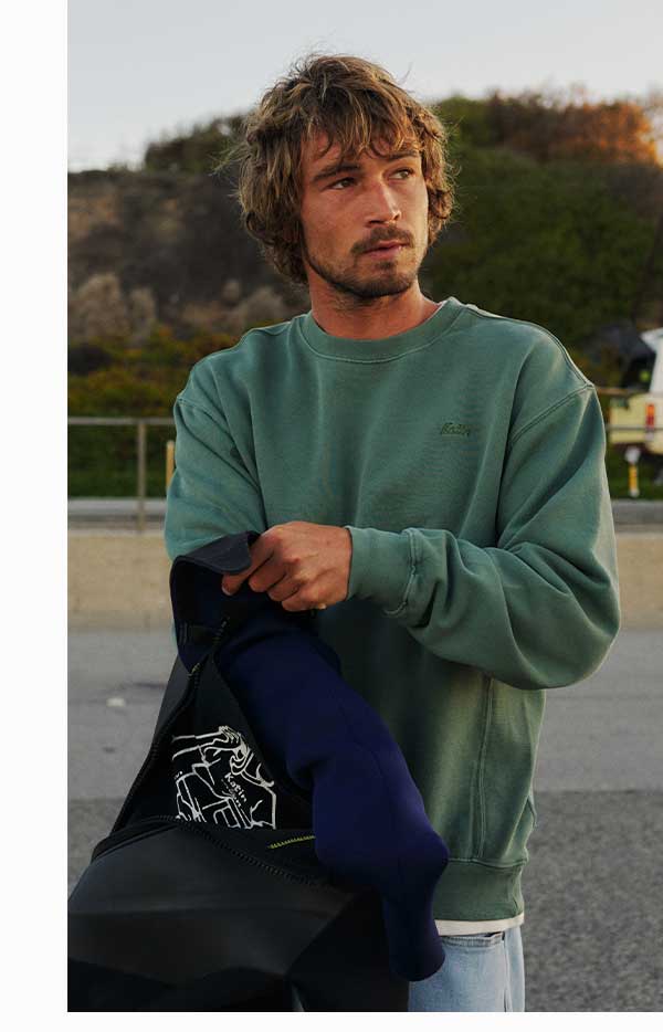 Male model in embroidered crewneck