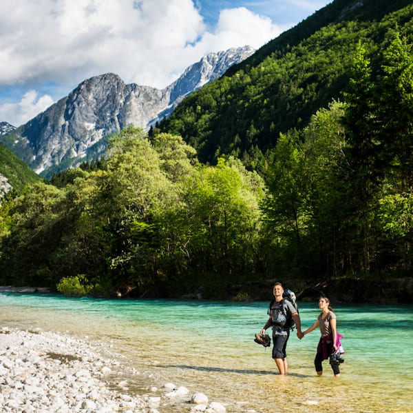Hikers along the Soča River, Julian Alps