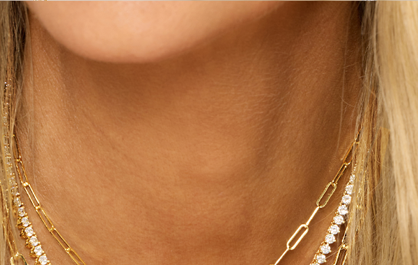 YOUR BASE LAYER: Delicate paperclip links and light layers add polish without overpowering the stack.