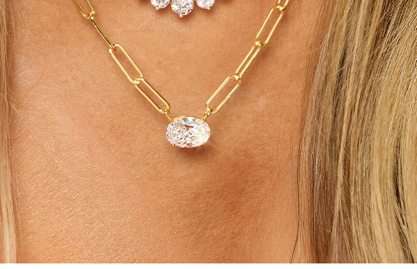 YOUR BASE LAYER: Delicate paperclip links and light layers add polish without overpowering the stack.