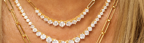 YOUR BASE LAYER: Delicate paperclip links and light layers add polish without overpowering the stack.