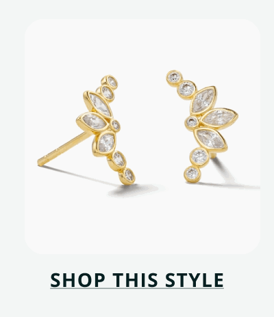 Gold fan-shaped studs with marquise & circle stones that go outward from center. Click here to shop this style