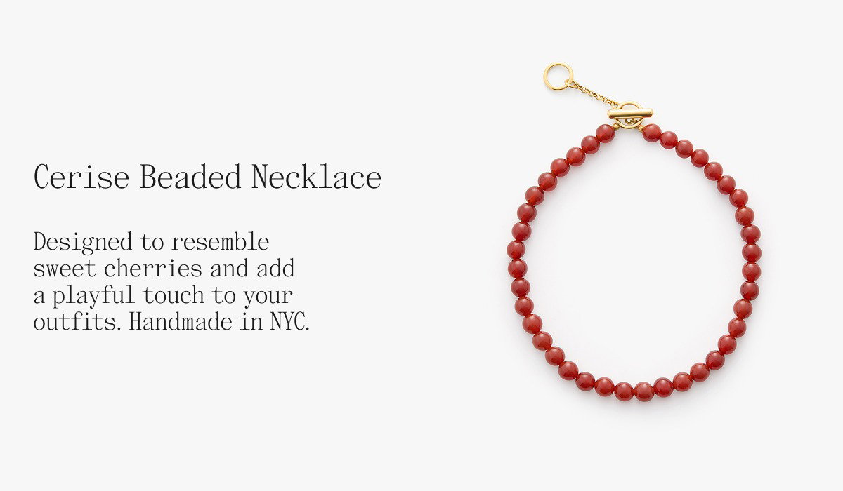 Cerise Beaded Necklace Designed to resemble sweet cherries and add a playful touch to your outfits. Handmade in NYC.
