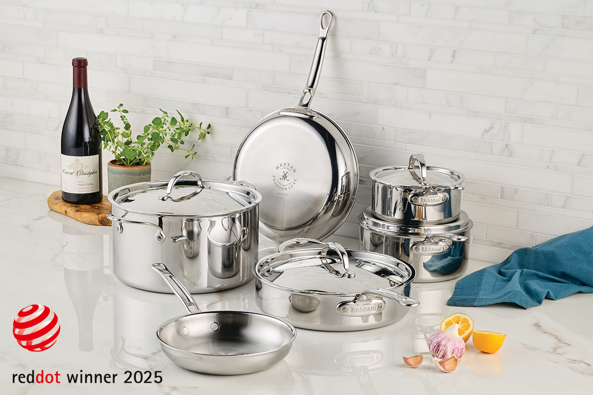 IMG: ProBond Luxe cookware on marble countertop. reddot winner 2025 logo at the lower left corner