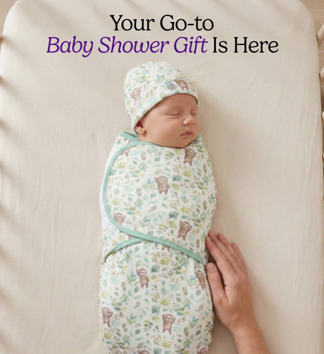 Baby wearing a Sloth Swaddle & Beanie Gift Set. Shop now.